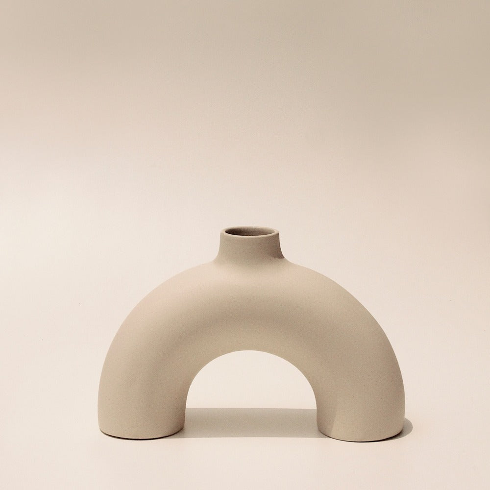 Half Polo semi-circular sculptural vase, front view